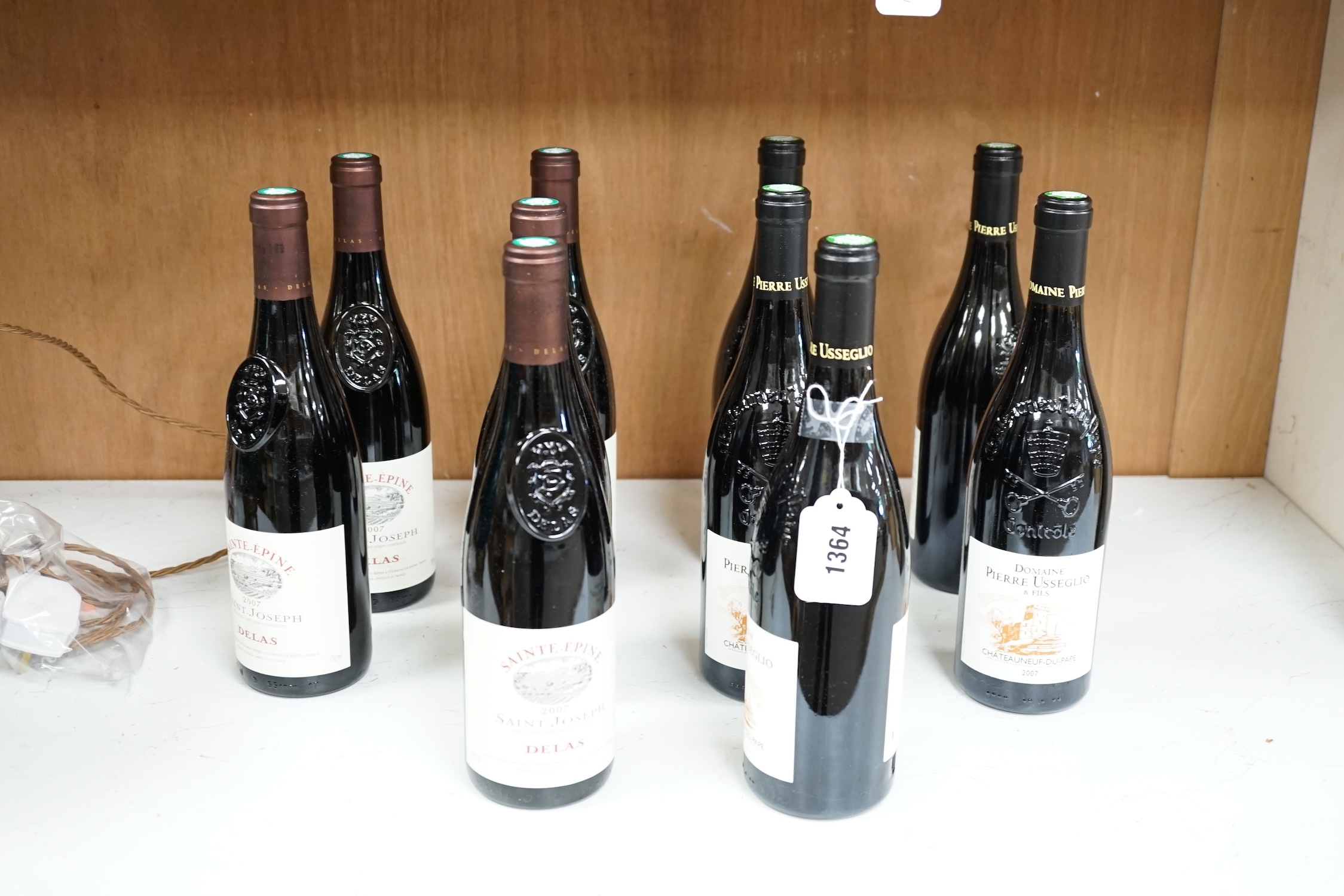 Twelve bottles of wine to include six bottles of Domaine Pierre Usseglio & Fils Châteauneuf du Pape 2007, and six bottles of Sainte-Epinephrine Saint-Joseph 2007. Condition - good, storage history unknown.